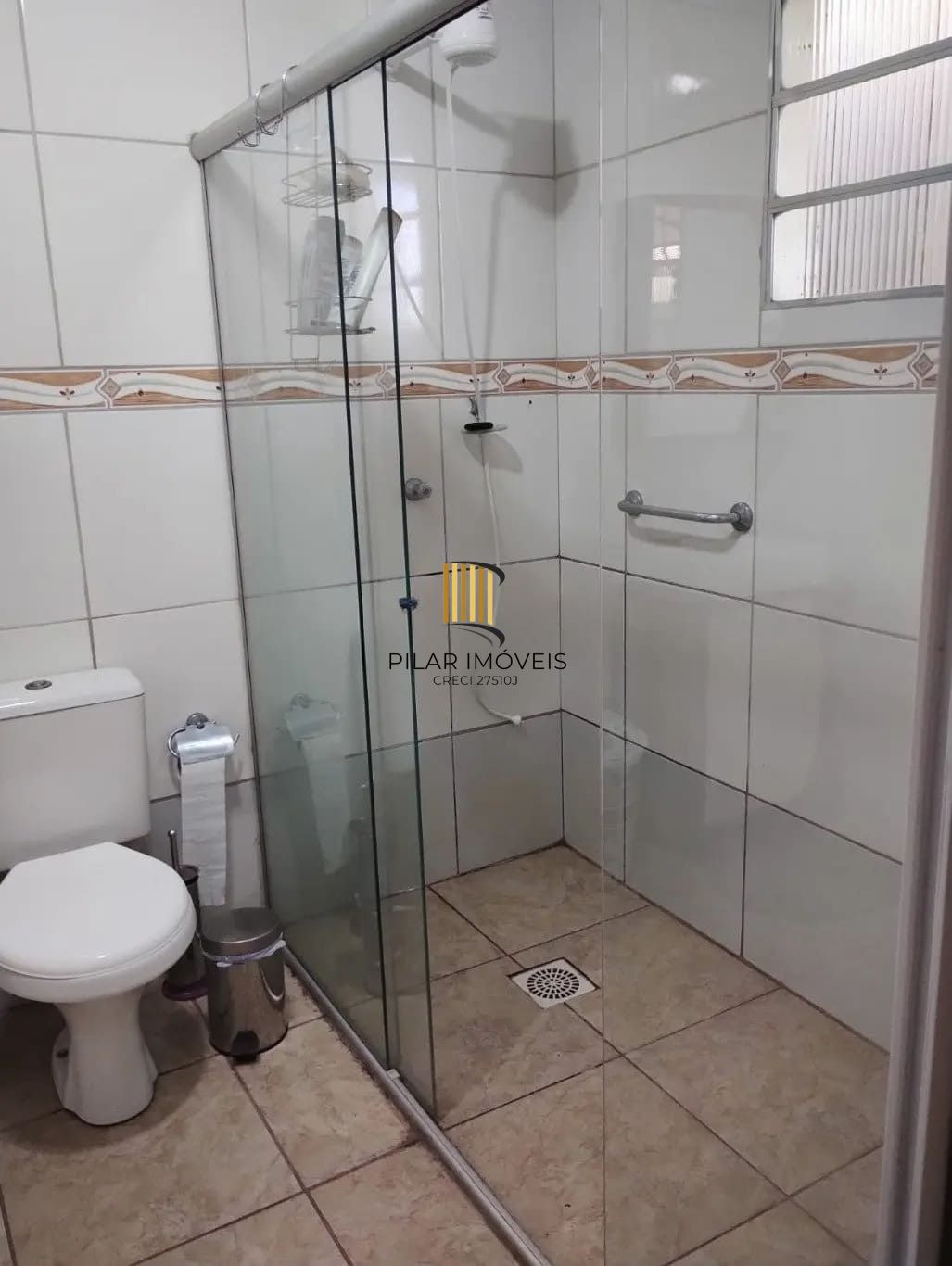 Casa de 3 dormitórios e 111m² à venda em Jardim Botânico, Porto Alegre.