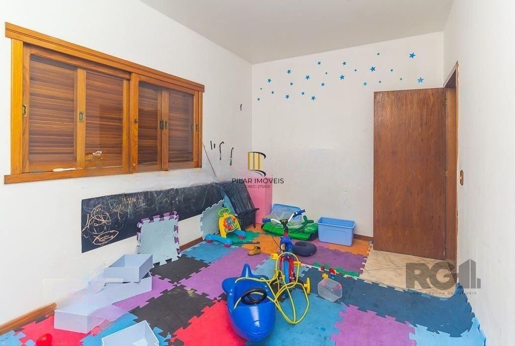 Casa 3 dormitórios no bairro Glória