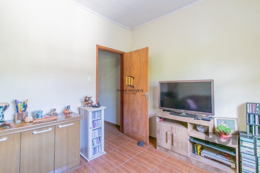 Casa com 3 dormitórios e 3 vagas no bairro Santa Tereza