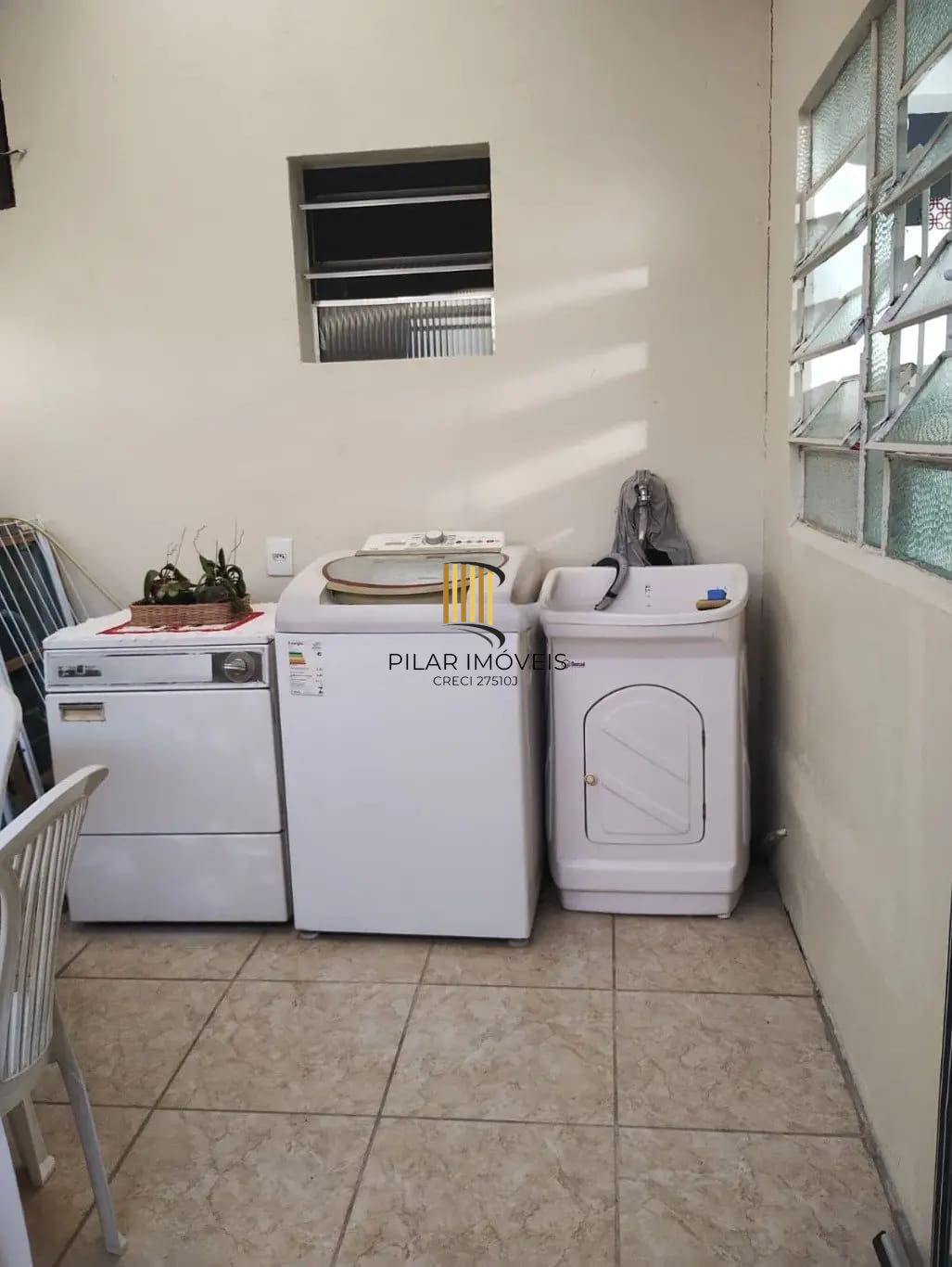 Casa de 3 dormitórios e 111m² à venda em Jardim Botânico, Porto Alegre.