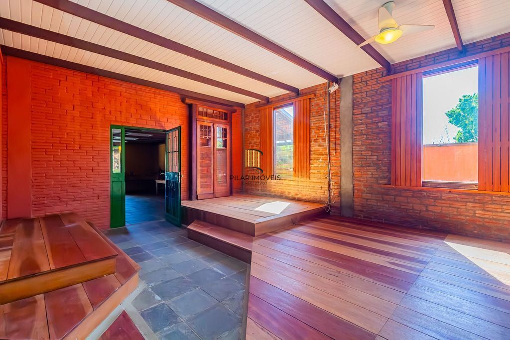 Casa de 3 dormitórios, no Bairro Ponta Grossa - Porto Alegre