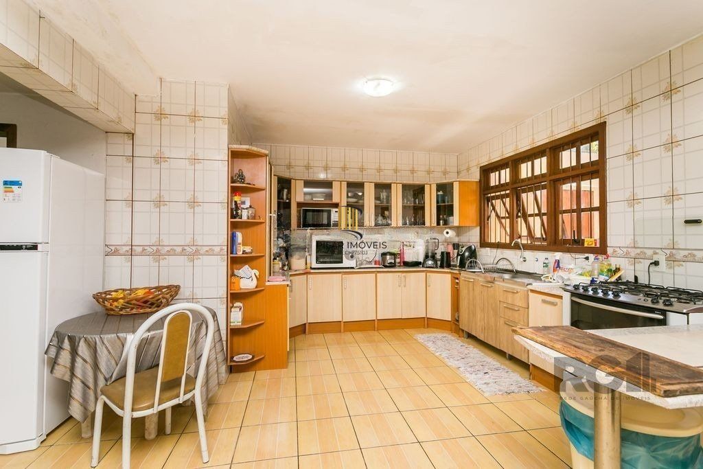 Casa 5 dormitórios no bairro Cristal