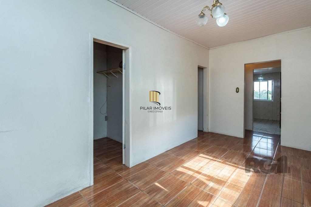 Casa de 4 dormitórios no bairro Camaquã