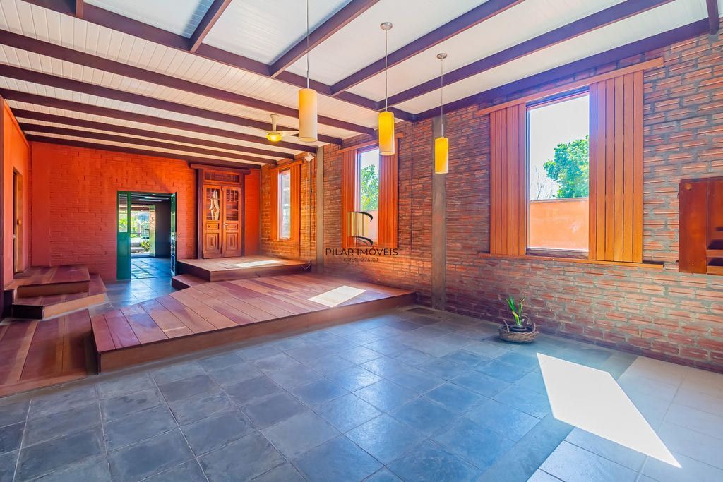 Casa de 3 dormitórios, no Bairro Ponta Grossa - Porto Alegre