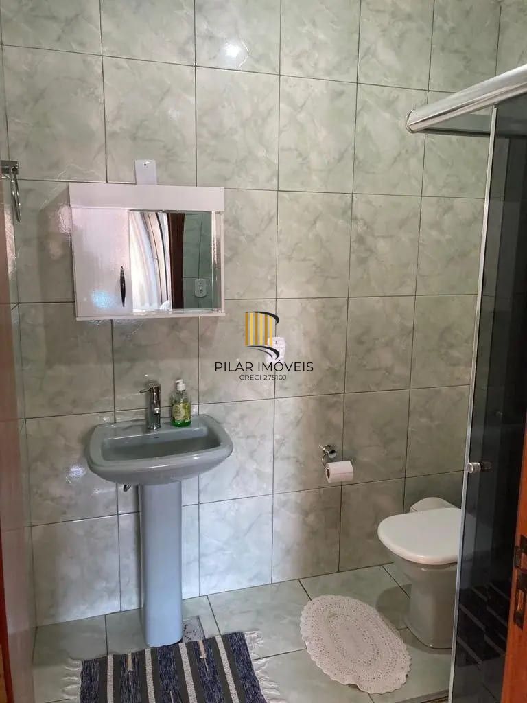 Casa de 3 dormitórios com 181m² à venda em Partenon, Porto Alegre.