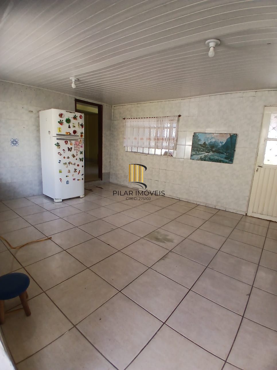 Ampla casa com patio no bairro Rubem Berta .