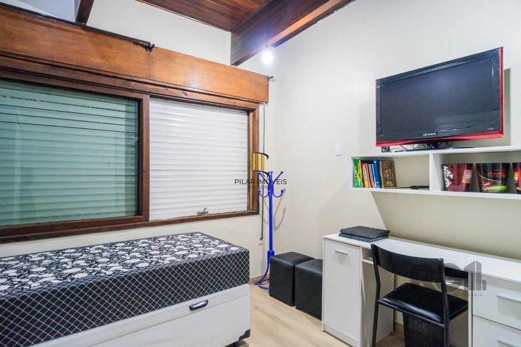 Casa 4 dormitórios no bairro Nonoai