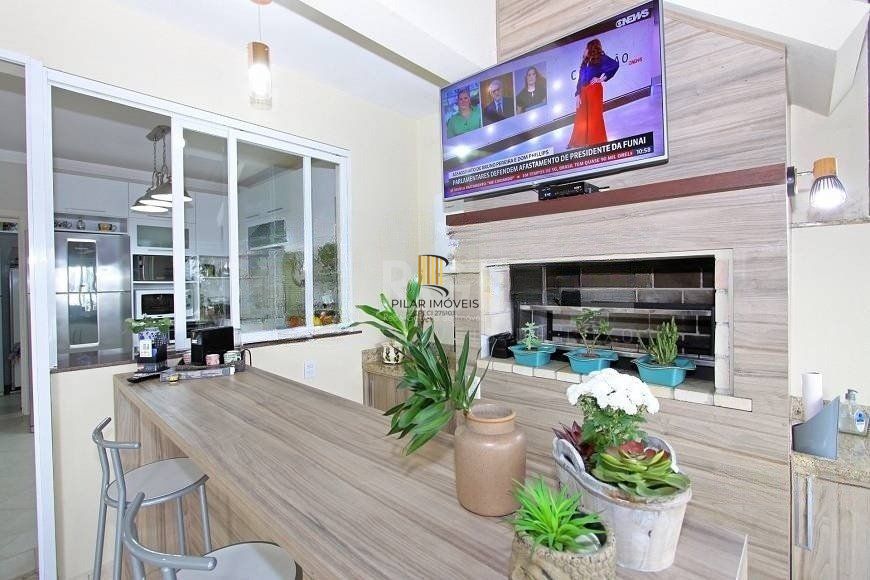 EXCELENTE CASA COM 4 DORMITÓRIOS, 6 VAGAS DE GARAGEM E VISTA PANORÂMICA.