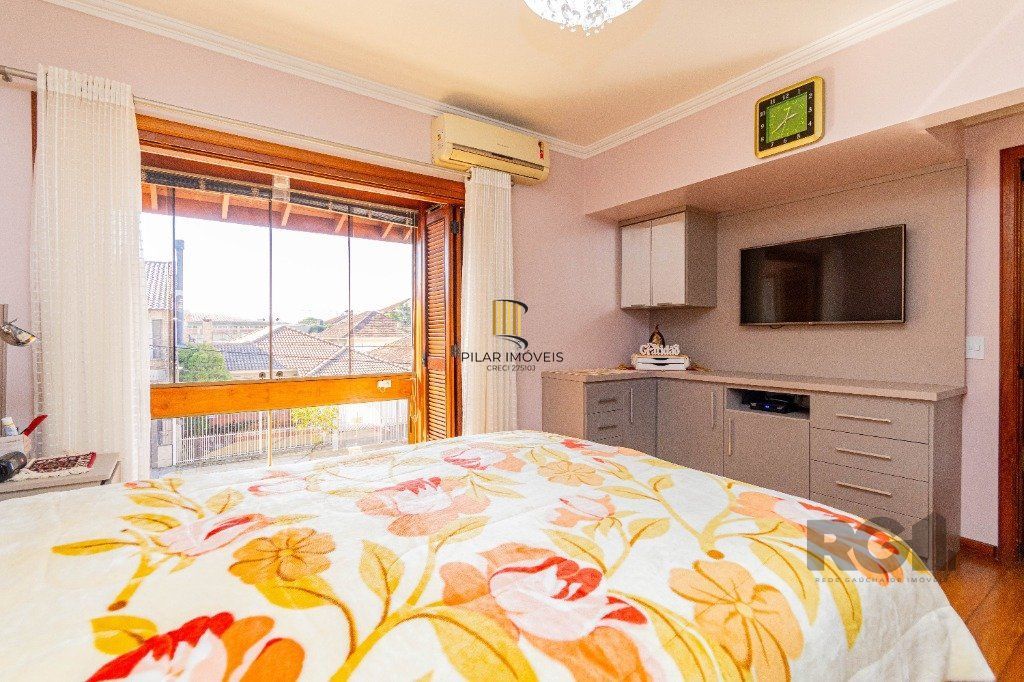 Casa de 4 dormitórios 304m² no bairro Jardim Lindóia