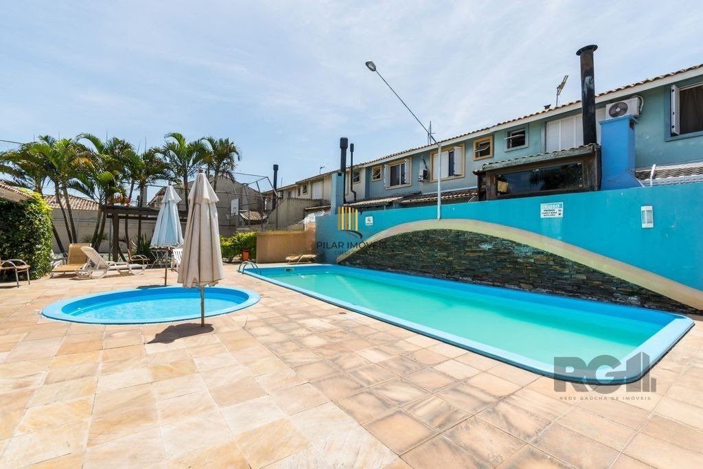 Casa em condomínio fechado - 70m², 2 dormitórios, 1 vaga de garagem no bairro Humaitá