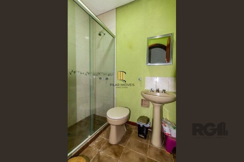 Casa 303m² - 4 dormitórios, 2 vagas no bairro Santo Antônio