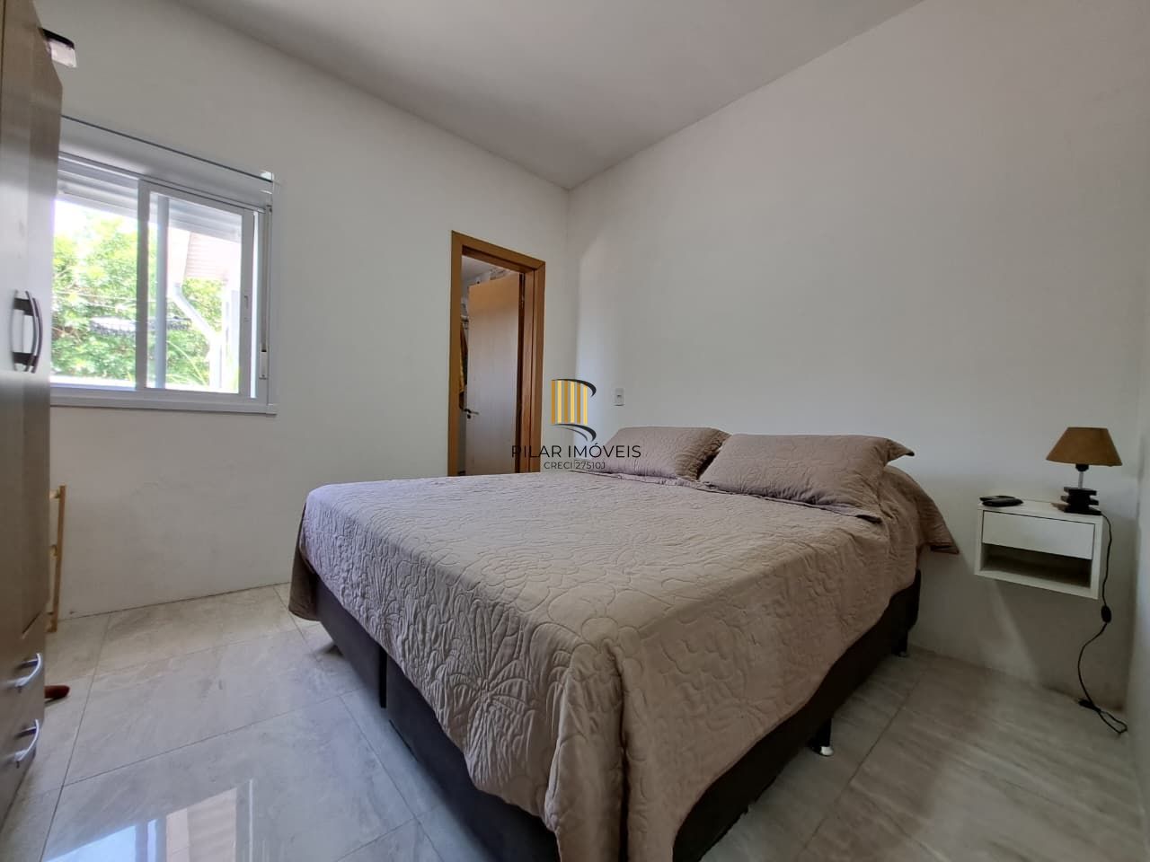Casa com 04 dormitórios e piscina na praia de Imbé/ RS.