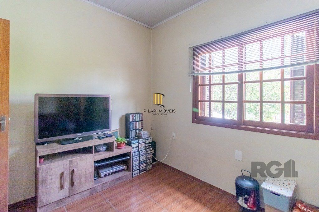 Casa com 3 dormitórios e 3 vagas no bairro Santa Tereza