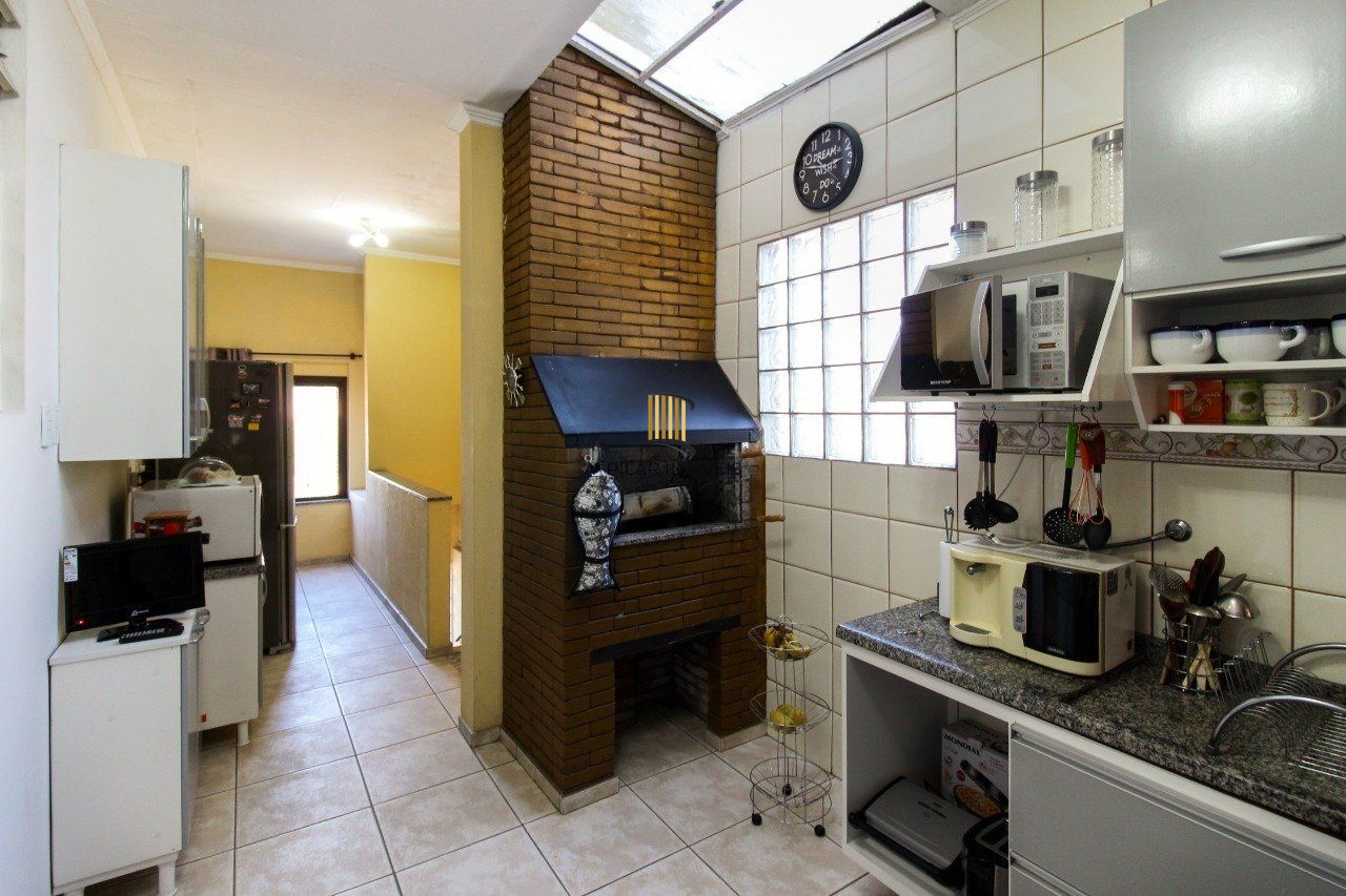 Casa com 6 dormitórios à Venda no Bairro Jardim Carvalho, Porto Alegre