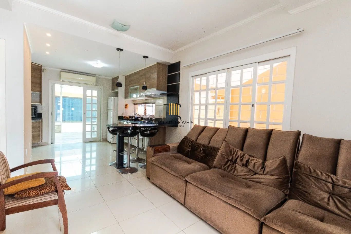 Casa com 3 dormitórios e 223m² à venda em Parque Santa Fé, Porto Alegre.