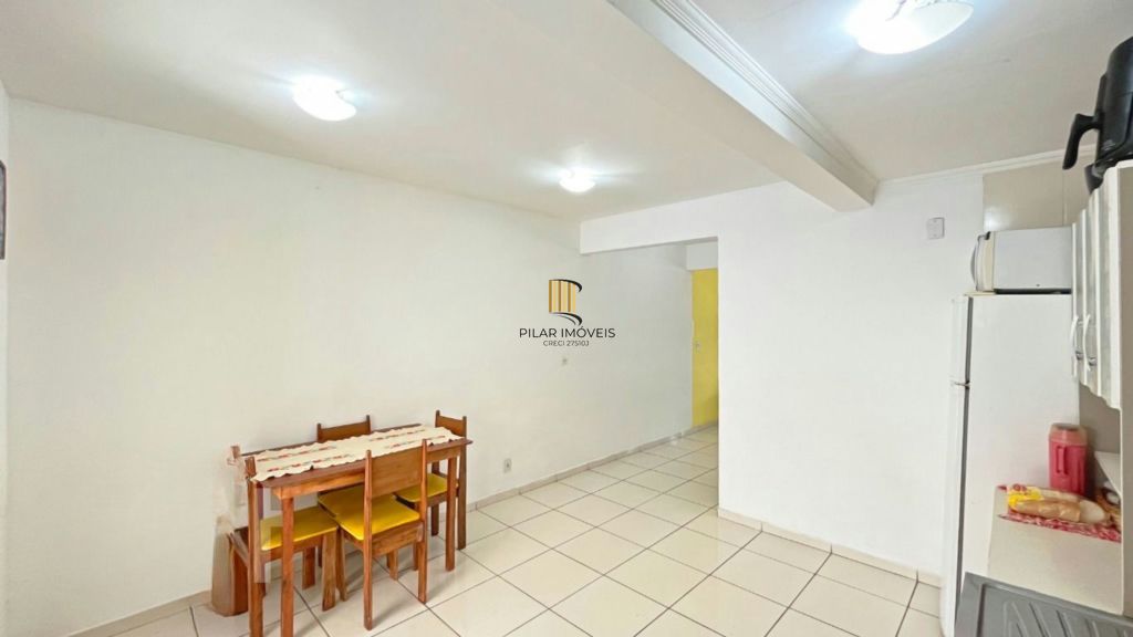 Casa de 2 dormitórios à venda Rua Heitor Kramer, Guarujá - Porto Alegre