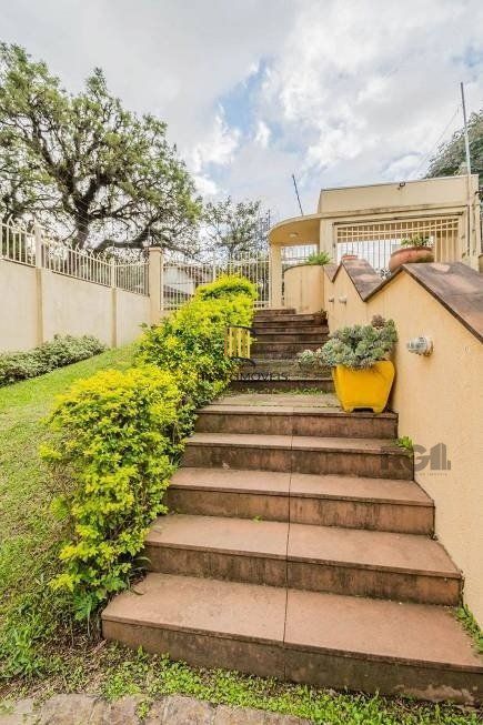 Casa 279m² - 4 dormitórios, 3 vagas no bairro Santa Tereza