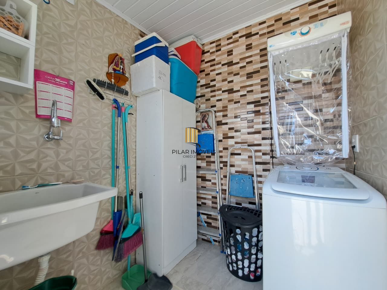 Casa com 04 dormitórios e piscina na praia de Imbé/ RS.