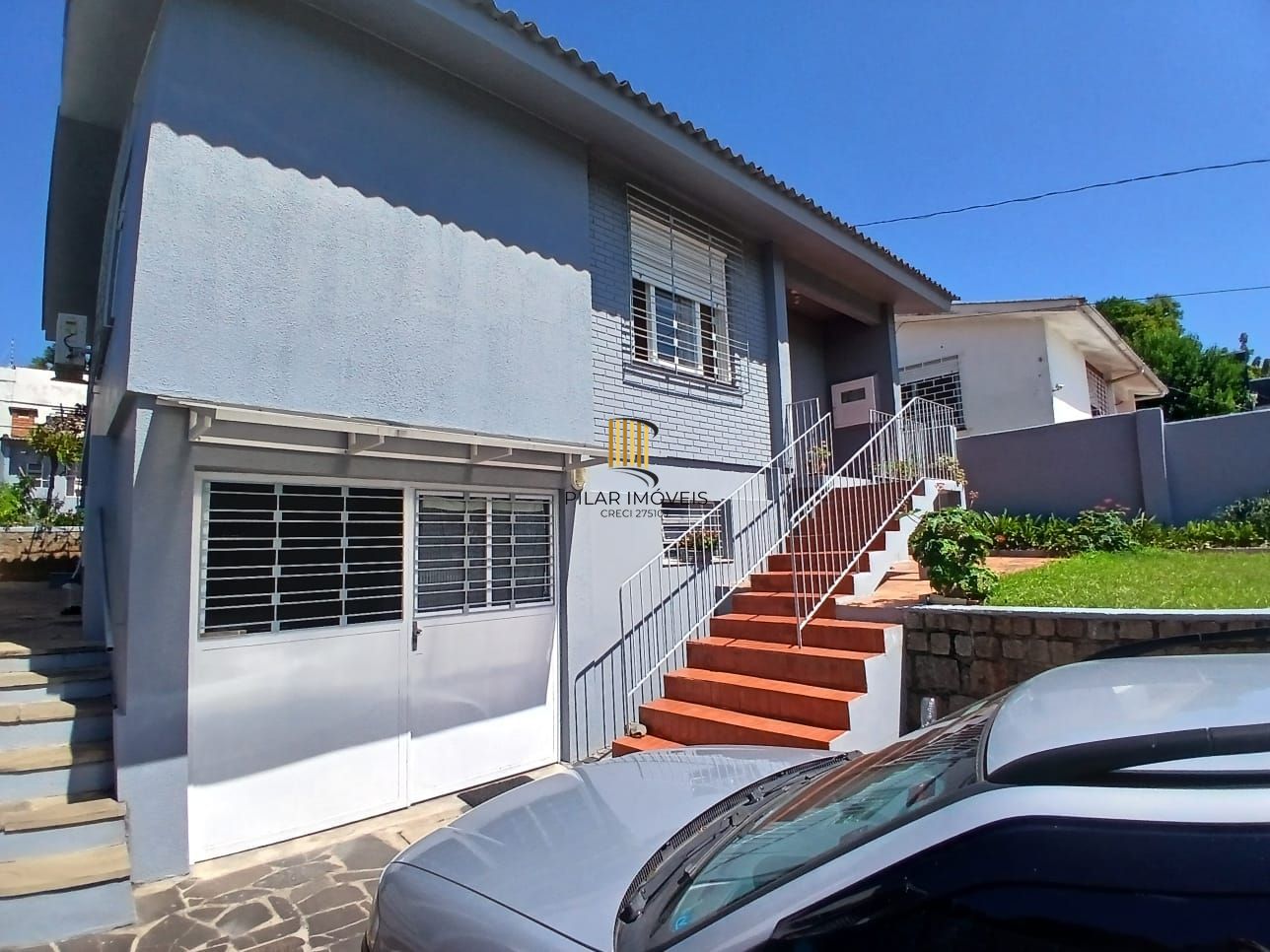 Casa com 03 dormitorios e amplo jardim no bairro Santa Tereza /RS