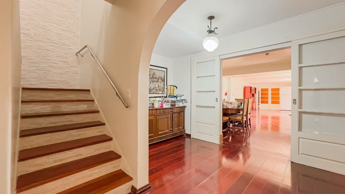 Sobrado de 3 dormitórios e 91m² à venda em Parque Santa Fé, Porto Alegre.