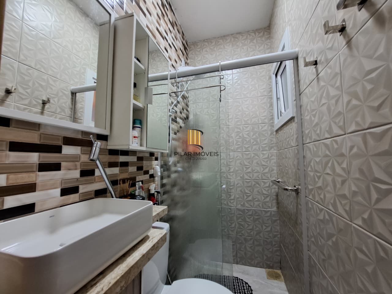 Casa com 04 dormitórios e piscina na praia de Imbé/ RS.