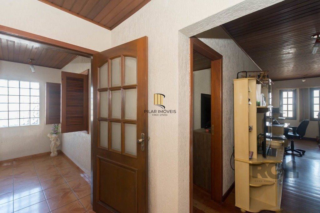 Casa de 4 quartos com 265m², no bairro Cavalhada