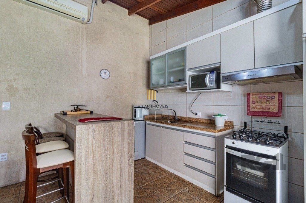 Casa de 3 dormitórios no bairro Cavalhada
