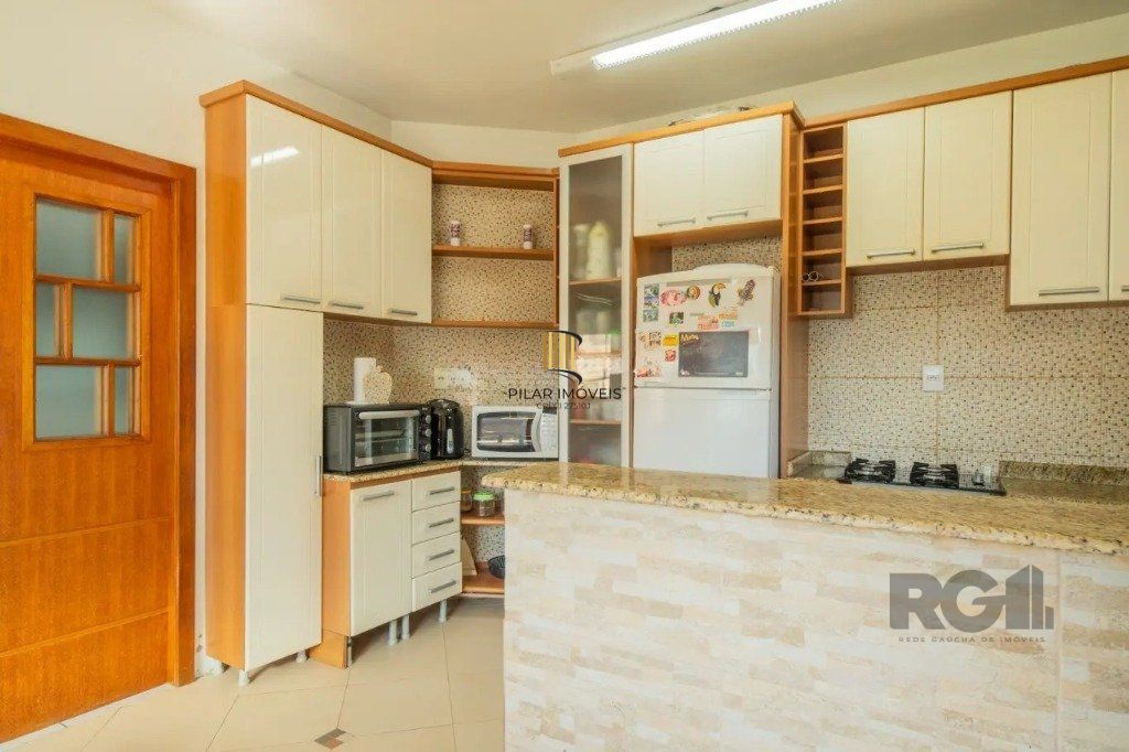 Casa de 3 dormitórios no bairro Nonoai
