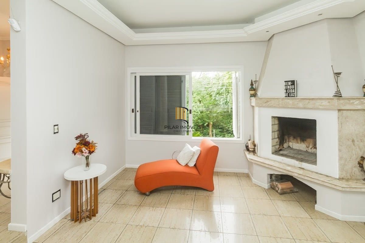 Casa com 5 dormitórios à venda em Parque Santa Fé, Porto Alegre.