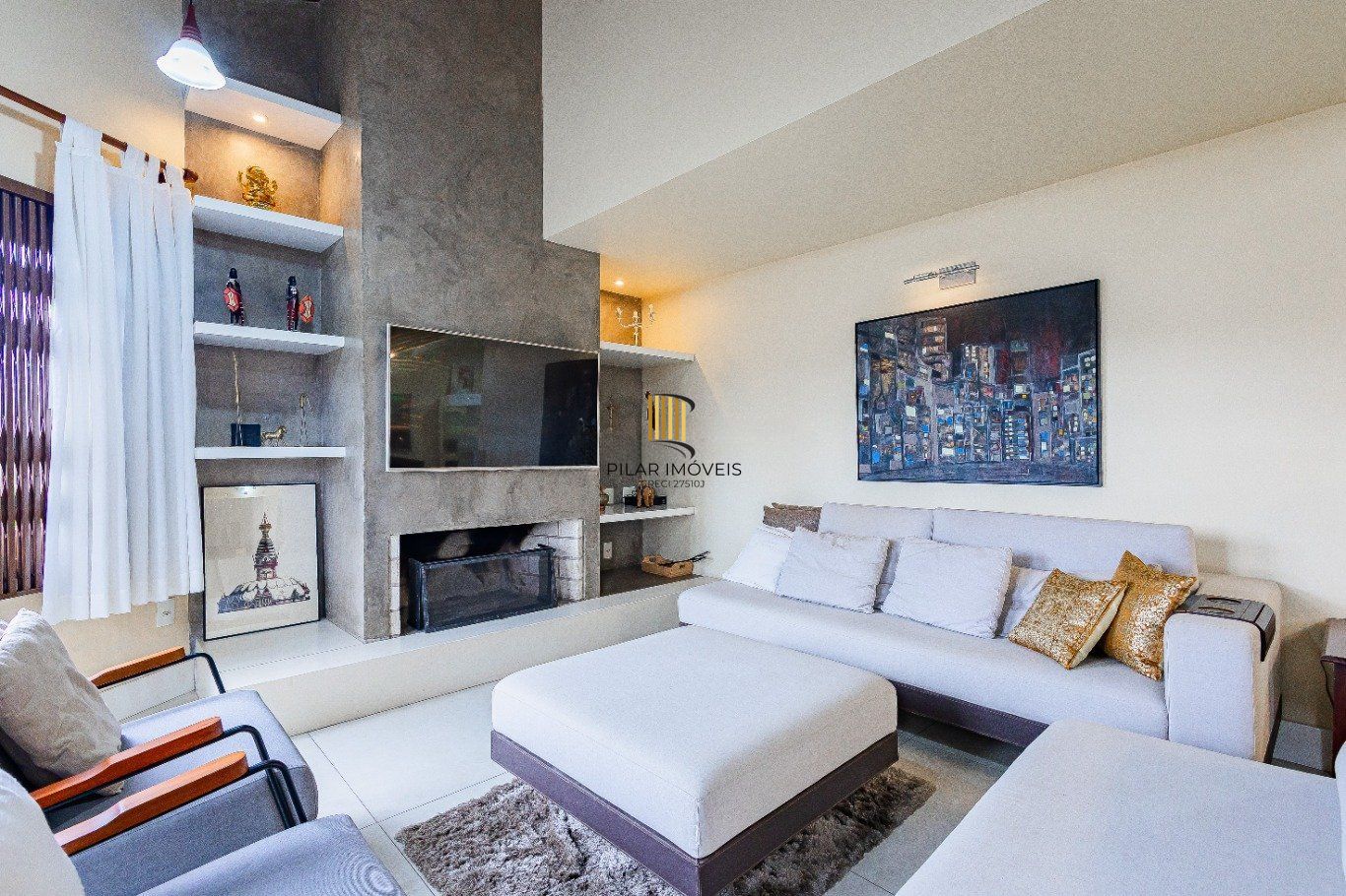 Casa de 4 dormitórios e 208m² à venda no Bairro Jardim Botânico, Porto Alegre.