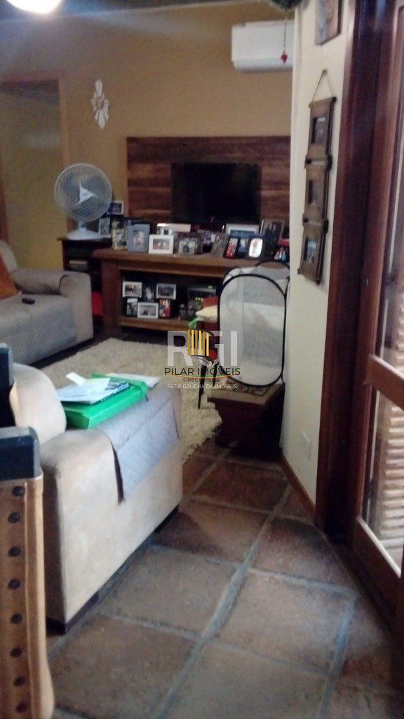 Casa 4 dormitórios no bairro Nonoai