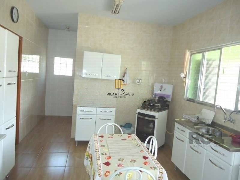 Casa 3 dormitórios no bairro Partenon