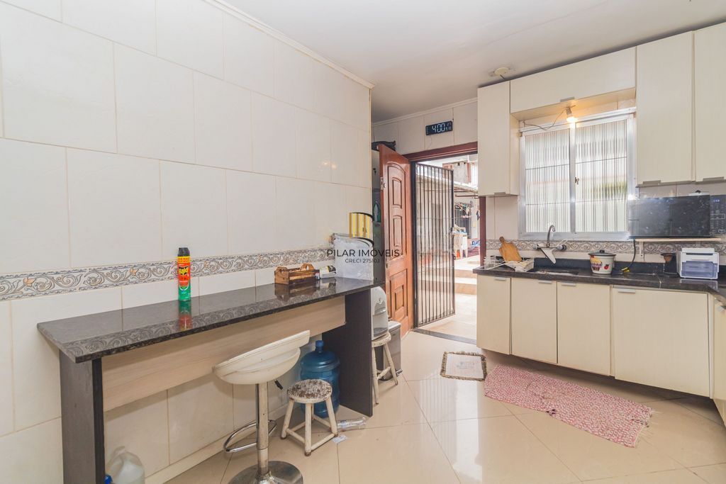 Casa de 3 dormitórios à venda no Bairro Parque Santa Fé - Porto Alegre