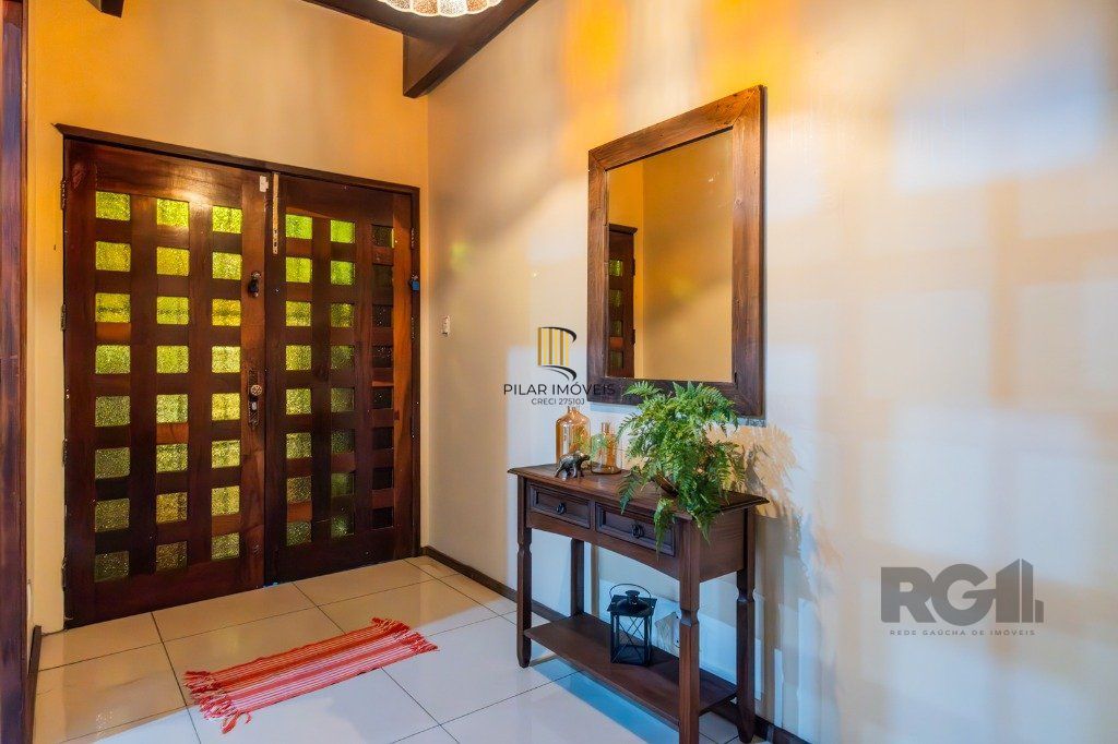 Casa 4 dormitórios no bairro Nonoai