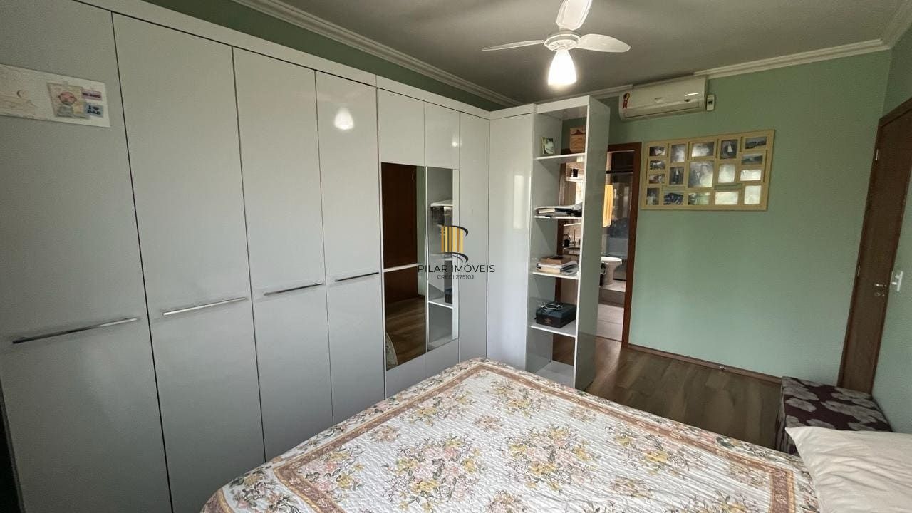 Casa de 4 dormitórios no bairro Santo Antônio, Porto Alegre