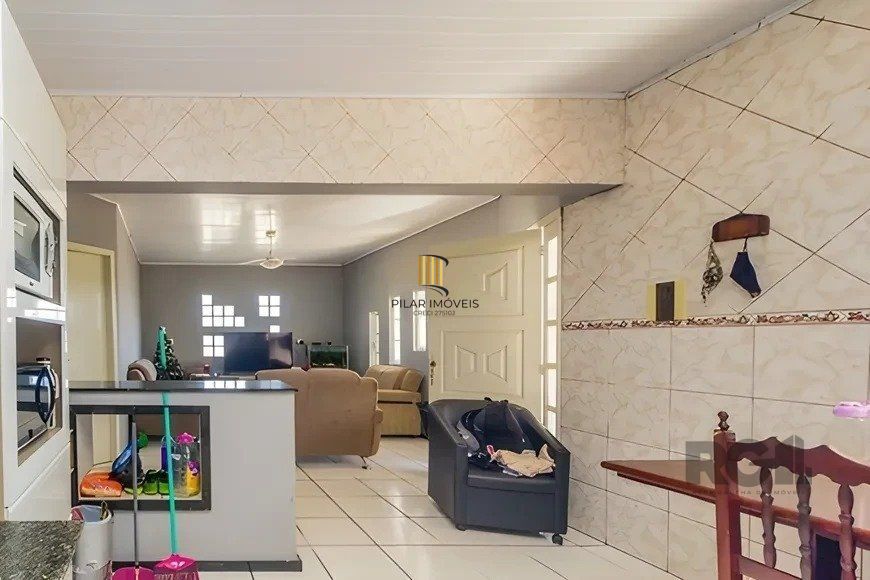 casa de 4 dormitórios,  no bairro Lomba do Pinheiro