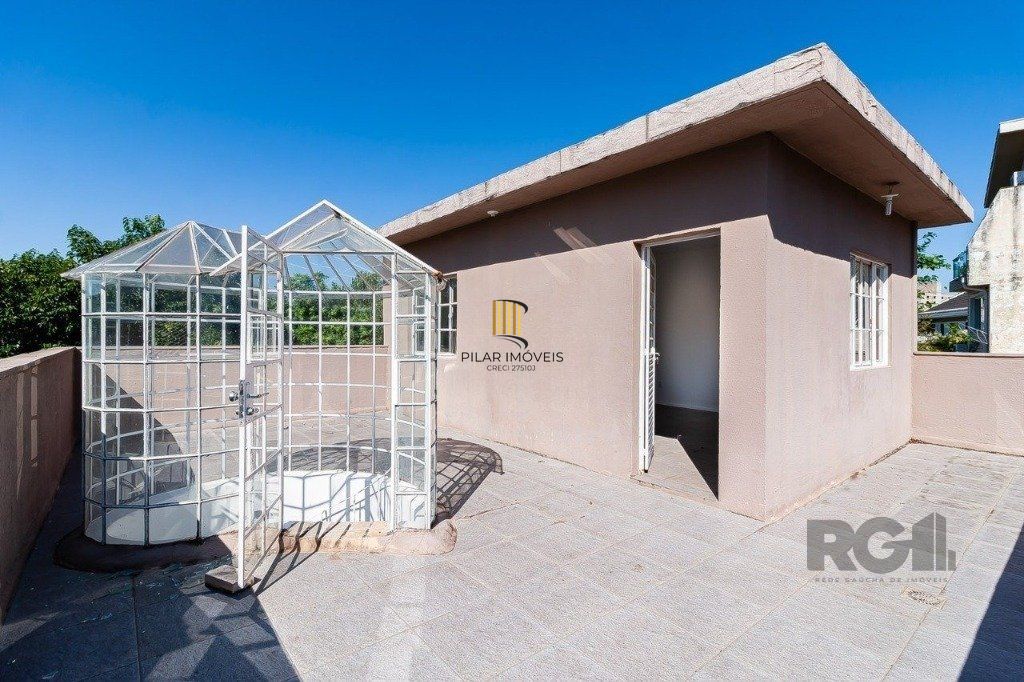 Casa de 4 dormitórios no bairro Três Figueiras