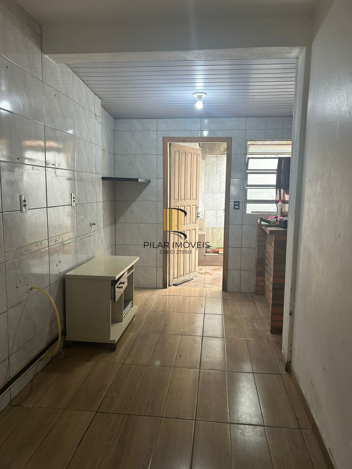 Casa de 02 dormitórios em condominio no bairro São Vicente -Porto alegre/RS.