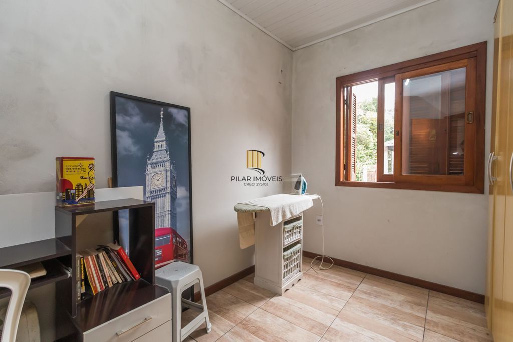 Casa de 6 dormitórios à venda Bairro Vila Nova - Porto Alegre