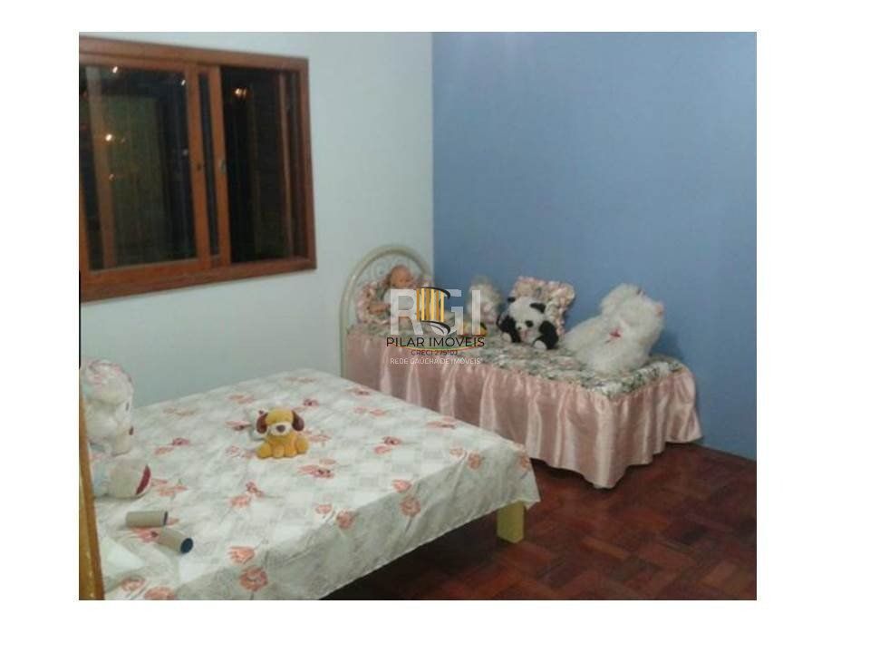 Casa para Venda - 634m², 2 dormitórios, sendo 1 suites, 3 vagas - Lomba do Pinheiro