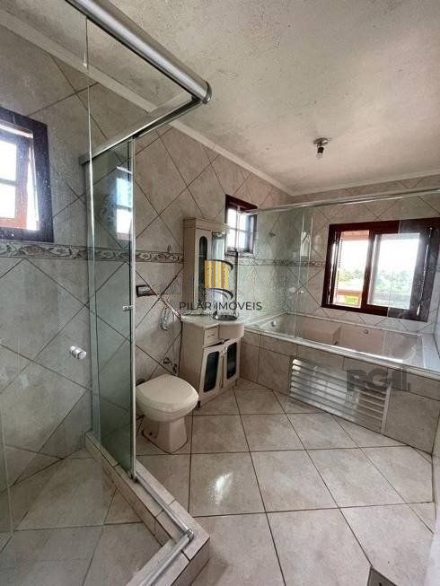 Casa de 4 dormitórios, bairro Ipanema