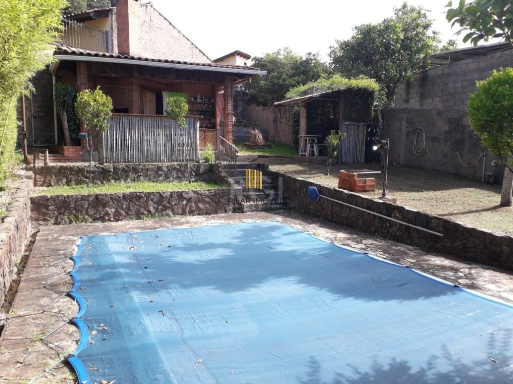Casa para Venda - 311m², 4 dormitórios, sendo 2 suites, 4 vagas - Glória