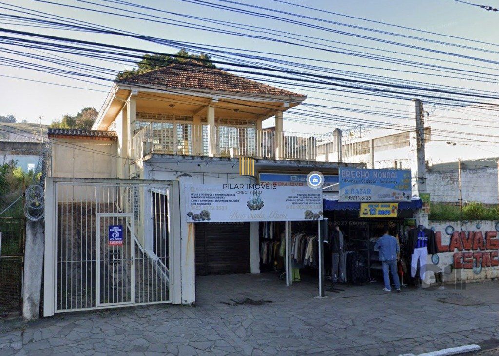 Casa 4 dormitórios no bairro Nonoai - Pilar Imóveis