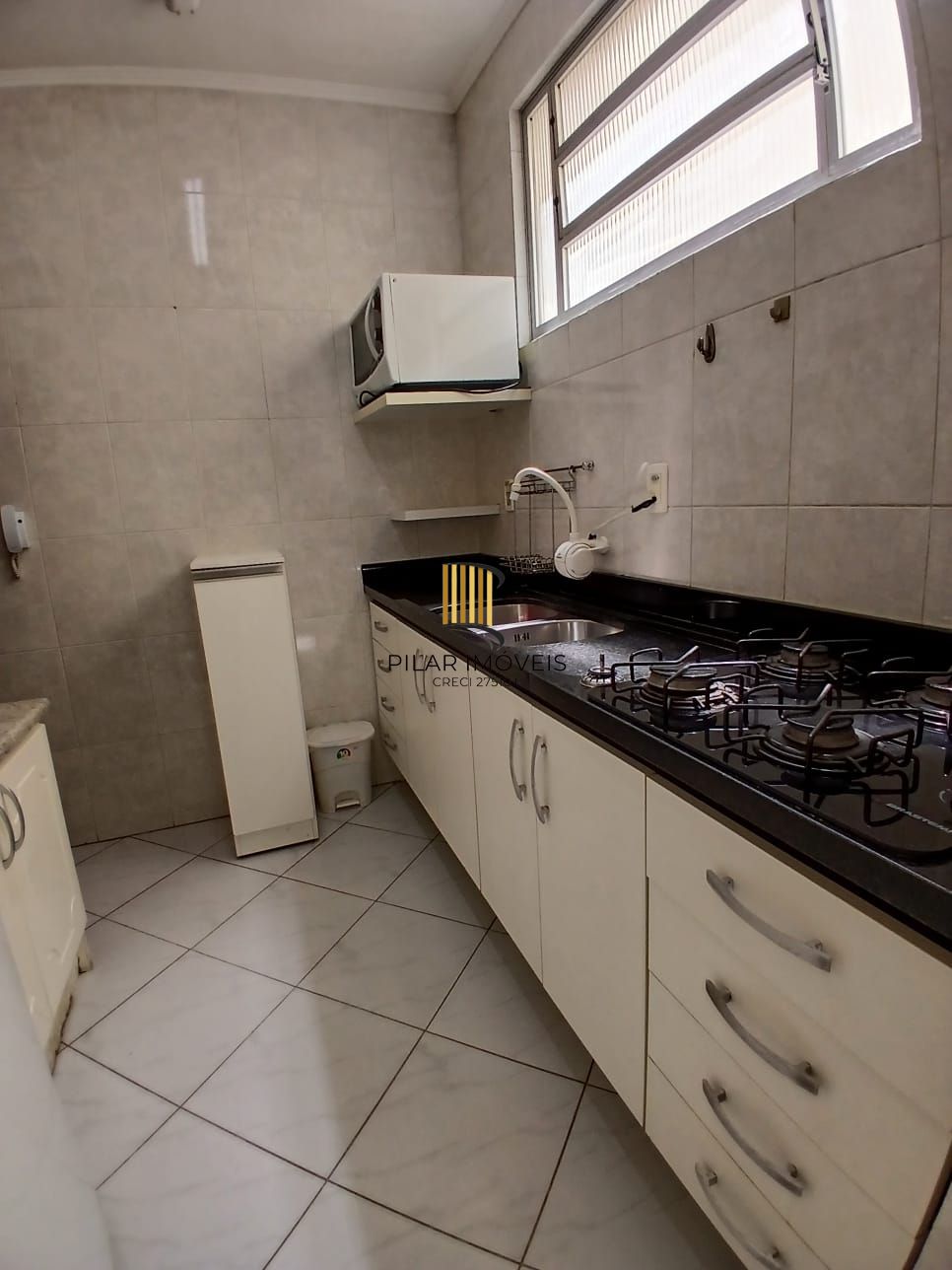 Apartamento de 02 dormitórios no bairro Independencia em Porto Alegre /RS.