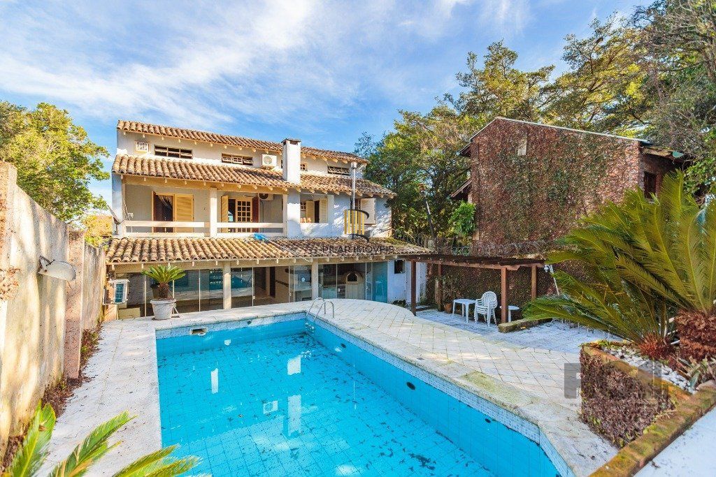 Casa 3 dormitórios no bairro Nonoai - Pilar Imóveis