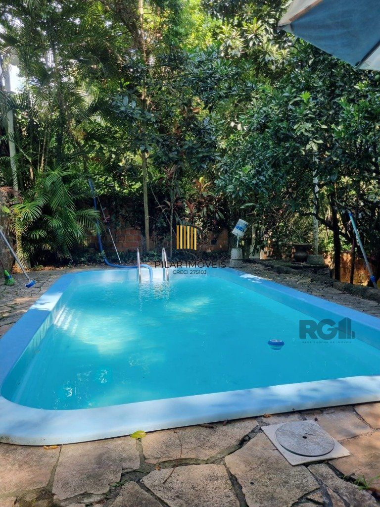 Casa 5 dormitórios no bairro Cavalhada