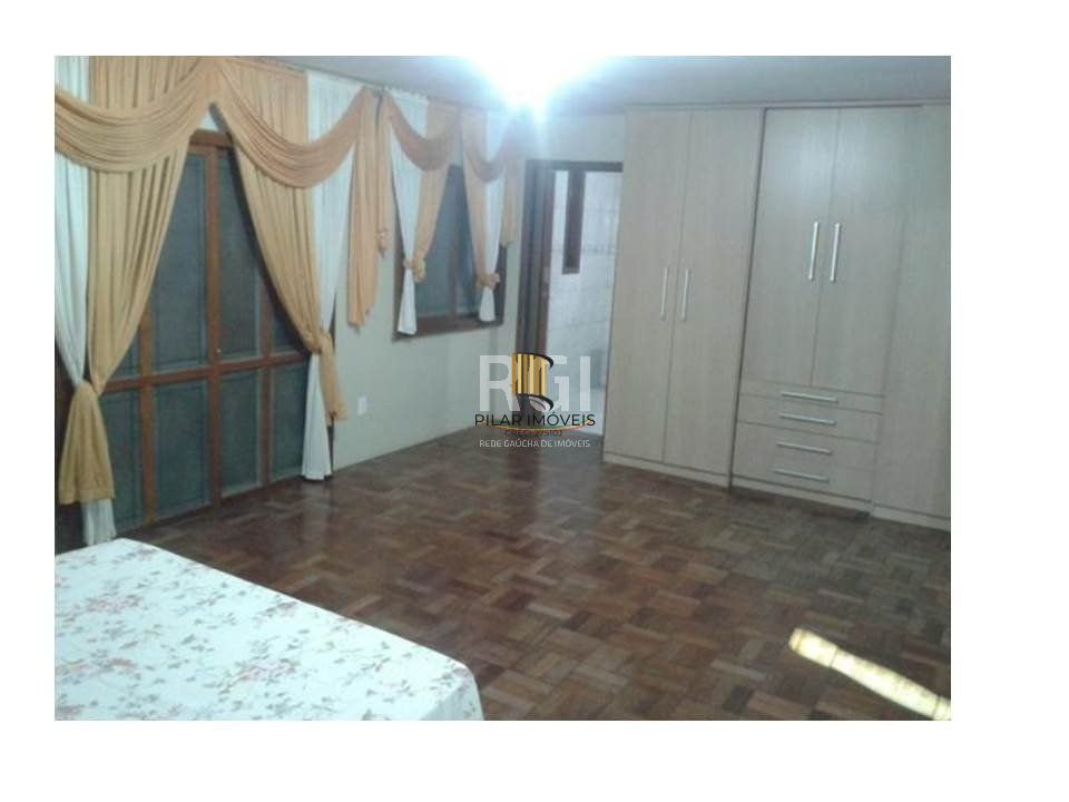 Casa para Venda - 634m², 2 dormitórios, sendo 1 suites, 3 vagas - Lomba do Pinheiro