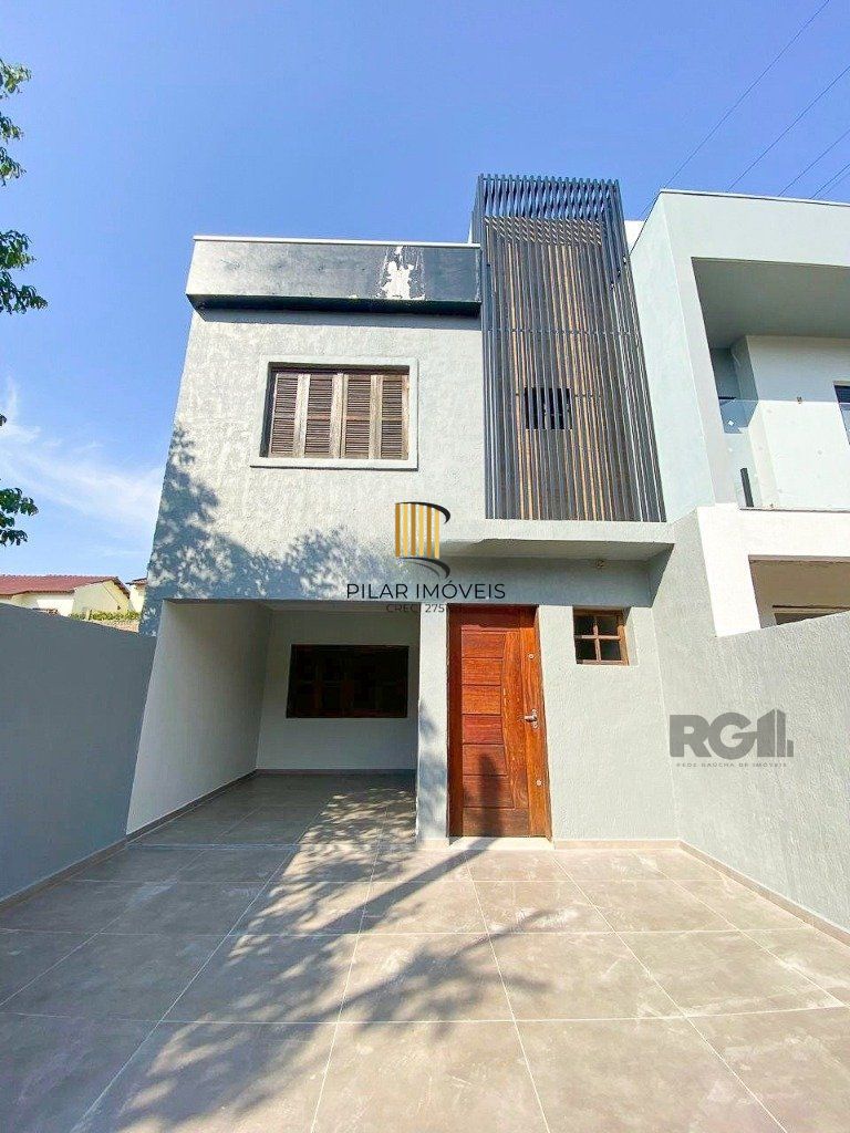 Casa de 3 dormitórios no bairro Mário Quintana