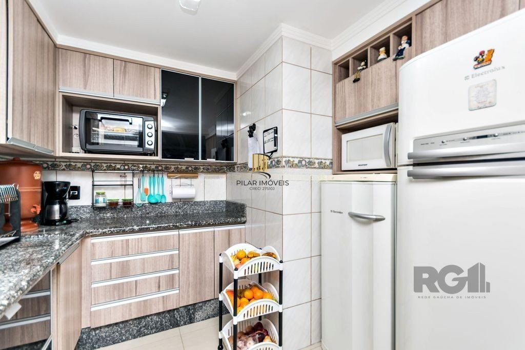 Casa 381m² - 5 dormitórios, 1 suíte, piscina e 6 vagas no bairro São Sebastião