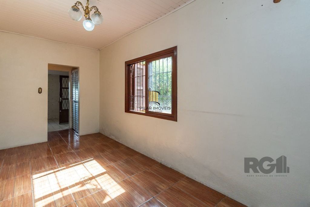 Casa de 4 dormitórios no bairro Camaquã